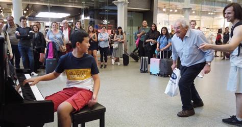 Two Men Interrupt Young Boy Playing Piano In London St. Pancras Train ...