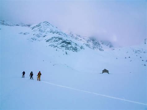 Three Skiers Ski Touring Photograph By Whit Richardson Fine Art America