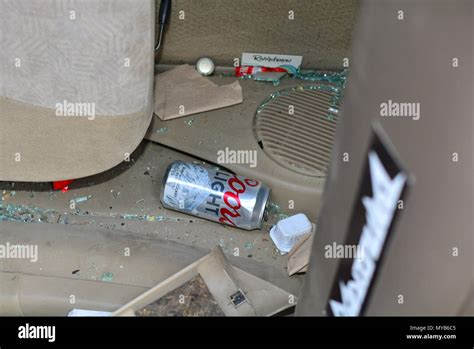 SUV car accident on it's side on a dirt road Stock Photo - Alamy