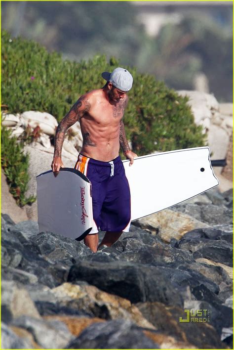 David Beckham Shirtless Surfing With A Bodyguard David Beckham Photo