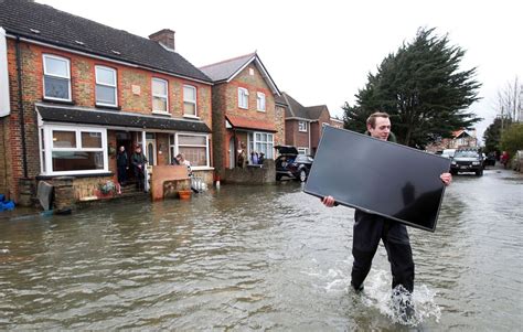 Uk Weather Residents Battle To Save Their Possessions In Flooded Homes