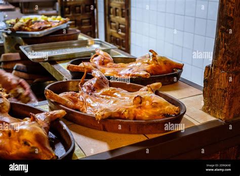 Roasted Suckling Pig Served Traditionally At A Spanish Restaurant Stock