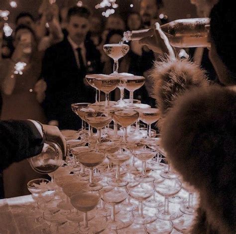 A Table Topped With Lots Of Wine Glasses Filled With Different Types Of