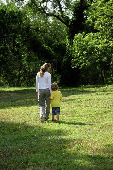 Mother And Son Walking