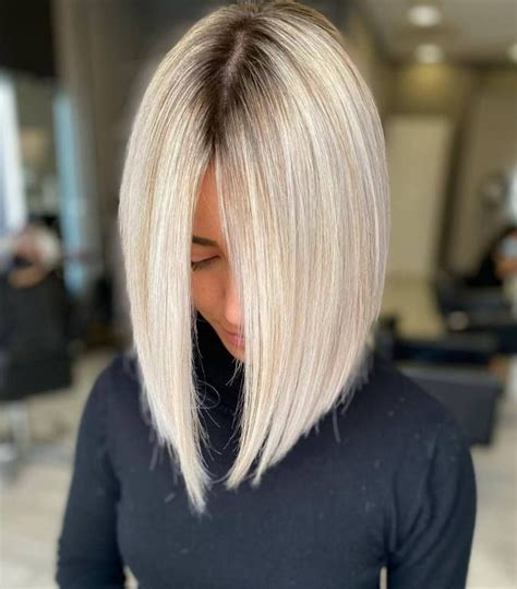 Long Platinum Blonde Bob With Shadow Roots Angled Haircut Blonde Bob