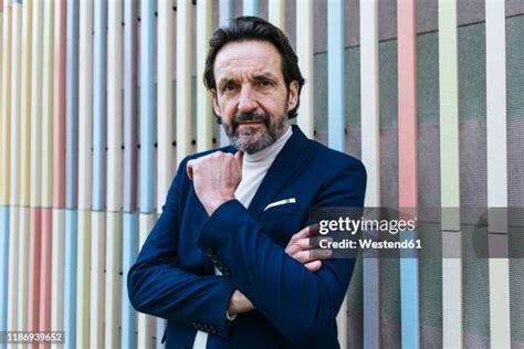 Sinister Man In Suit Photos And Premium High Res Pictures Getty Images
