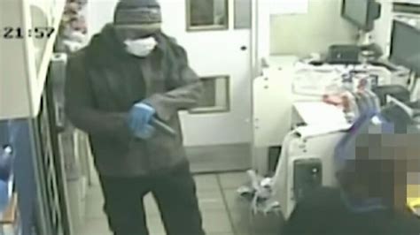 CCTV shows armed robbery at Tesco Express store | UK News | Sky News