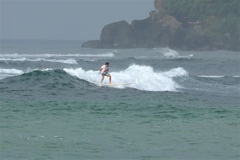 Surfing The Waves Of Koggala Beach In Sri Lanka Editorial Photography