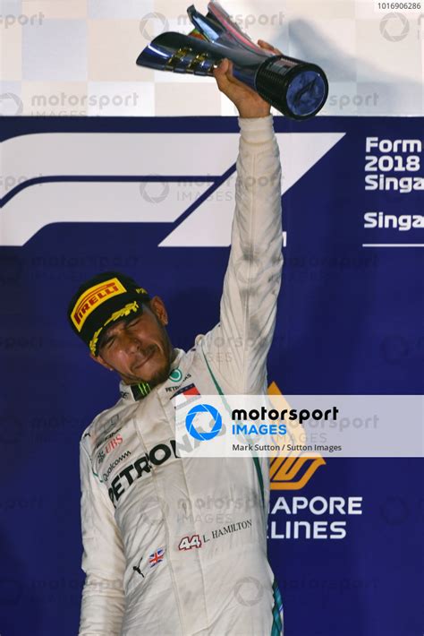 Race Winner Lewis Hamilton Mercedes AMG F1 Celebrates On The Podium