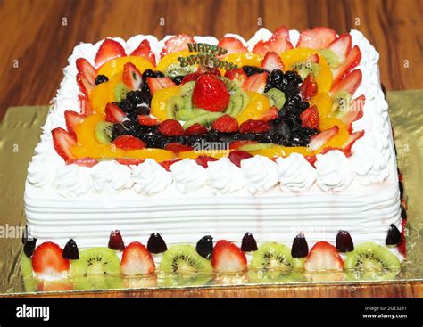 Delicious Creamy Fruit Cake. Birthday Wishing Beautiful Fruit Cake Stock Photo - Alamy