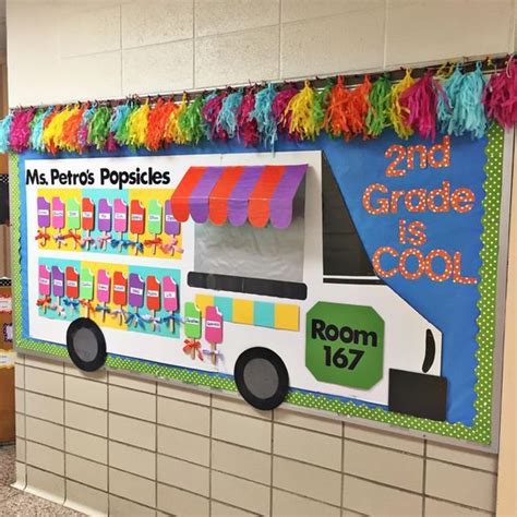 A School Bus Decorated With Colorful Streamers And Pom Poms On The Wall