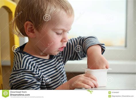 Funny Babe Blondes Licks Finger With Yogurt Stock Image Image Of Face