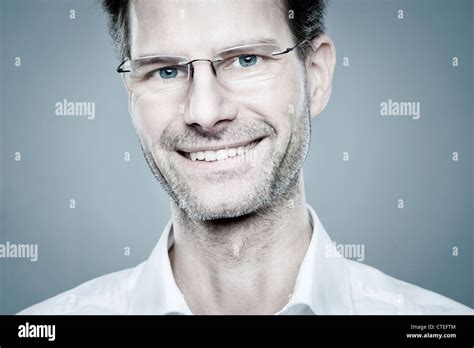 Portrait From A Happy And Smiling Man Stock Photo Alamy