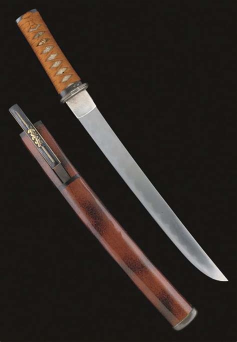 A Japanese tanto, the blade 18th century signed Bizen Osufune Sukesada ...