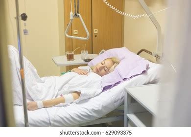 Bedridden Female Patient Lying Hospital Bed Stock Photo