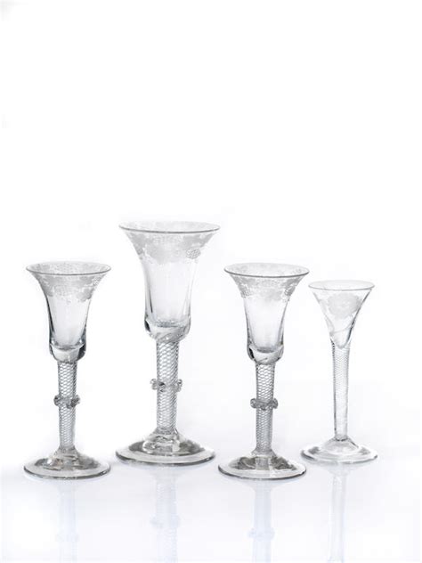 Bonhams A Set Of Three Engraved Airtwist Wine Glasses Circa 1750