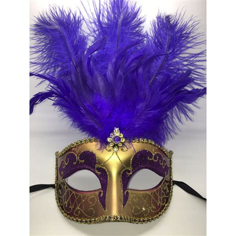 Purple and gold Mardi Gras mask with black ribbon ties. Each of these ...