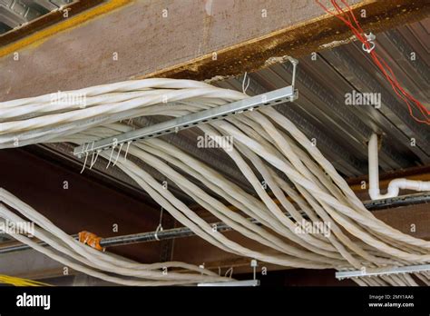 Electrical Wires In New Apartment Building Complex Were Laid And Installed On Ceiling Of