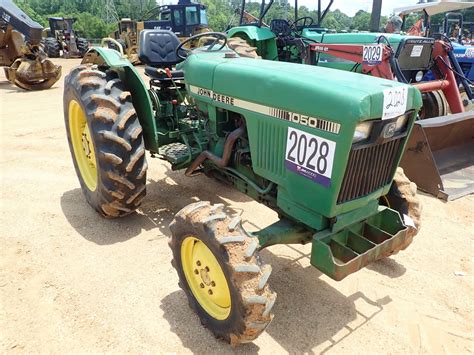 JOHN DEERE 1050 Tractor - J.M. Wood Auction Company, Inc.