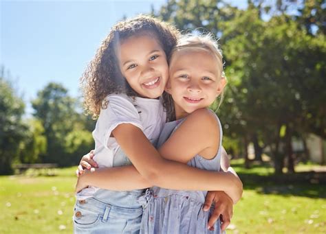 Premium Photo Summer Camp Portrait Or Happy Children Hugging In Park