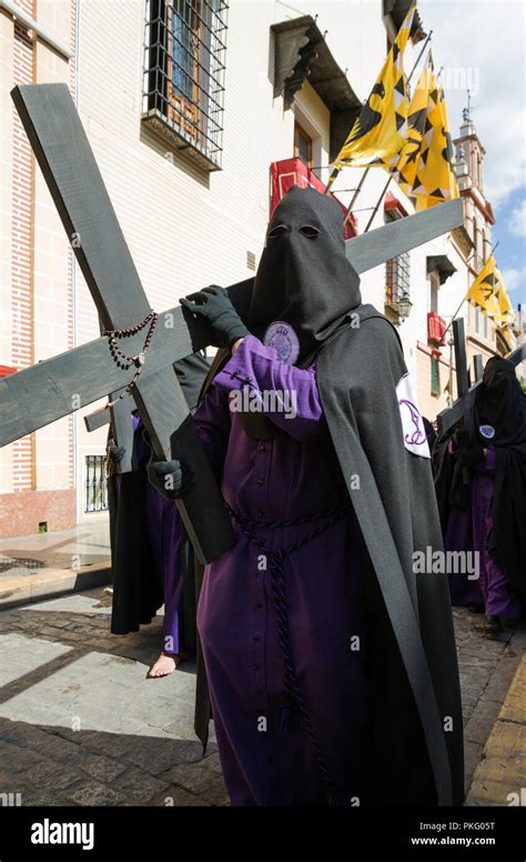 Penitent With Cross And Rosary At The Semana Santa The Holy Week