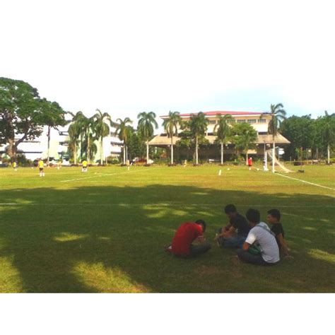 Koreans playing football. CPU school grounds, Iloilo, Philippines ...