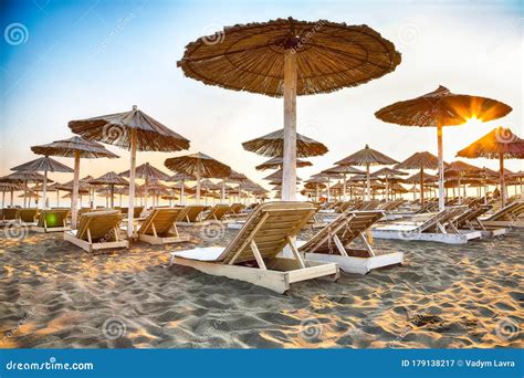 Sun Umbrellas And Deckchairs On The Copacabana Beach Part Of Great