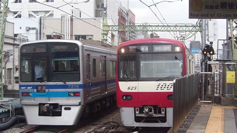 品川駅を発車する北総鉄道7300形（普通23m 印旛日本医大行き）と入線してくる京急1000形（神奈川新町行き） Youtube