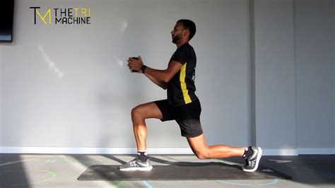 Static Lunge Hold Front Press Dumbbell Youtube