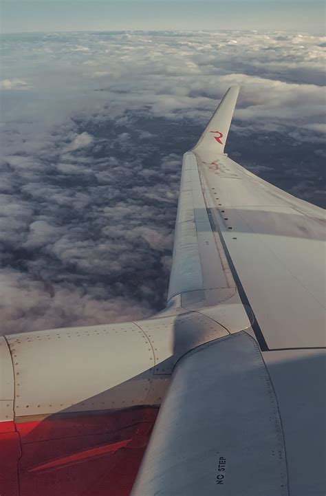 White Airplane Wing Under White Clouds Hd Phone Wallpaper Peakpx