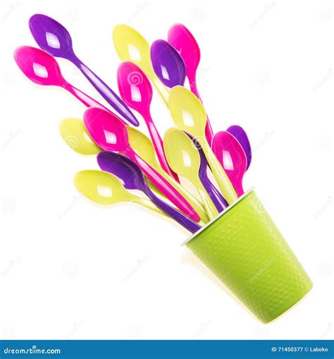 Multi Colored Plastic Spoons In The Single Cup Isolated On White Stock