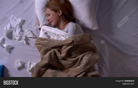 Woman Crying In Bed