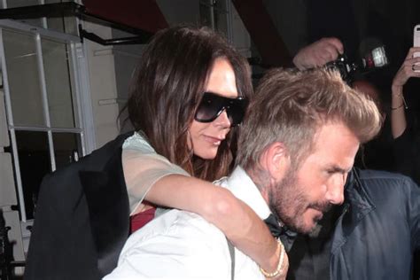 David Beckham Playfully Carries Victoria Beckham From Her Birthday