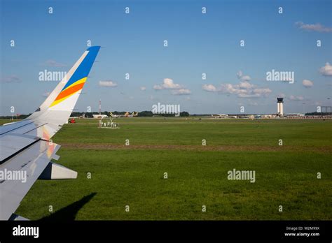 The window view from an Allegiant Air jetliner taxiing for takeoff from