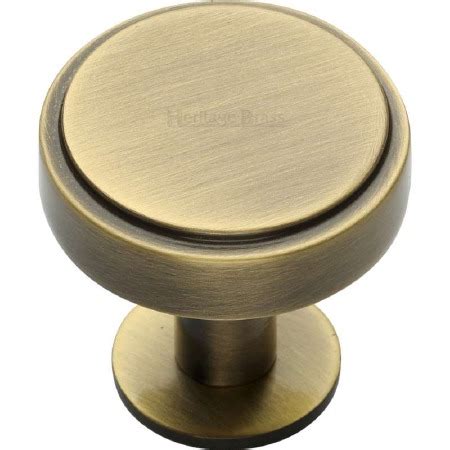 Heritage Stepped Cabinet Knob C3954 32mm Antique Brass Broughtons