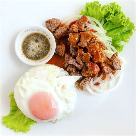 Traditional Cambodian Breakfast Beef Loklak With Lemon Pepper Sauce