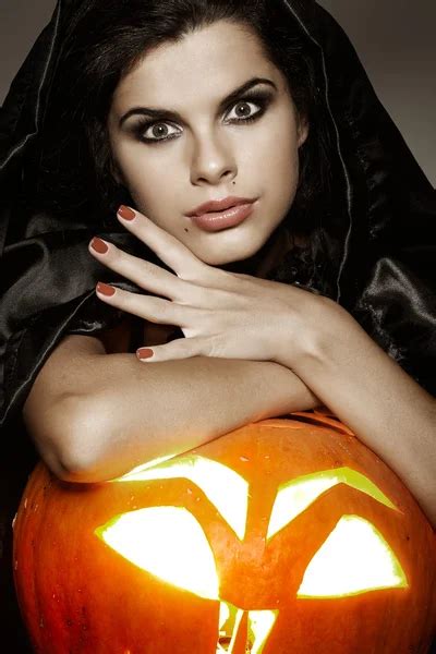 Sexual Brunette In The Suit Of Witch In Night Of Halloween Stock Photo