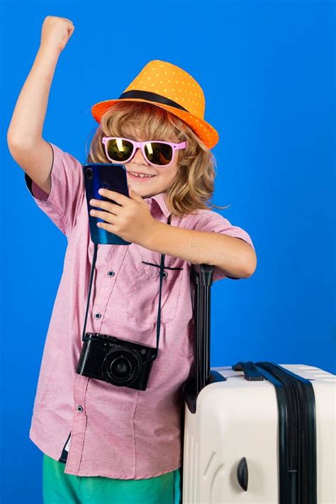 Child Tourist with Travel Bag Travelling. Kid with Suitcase on Studio ...