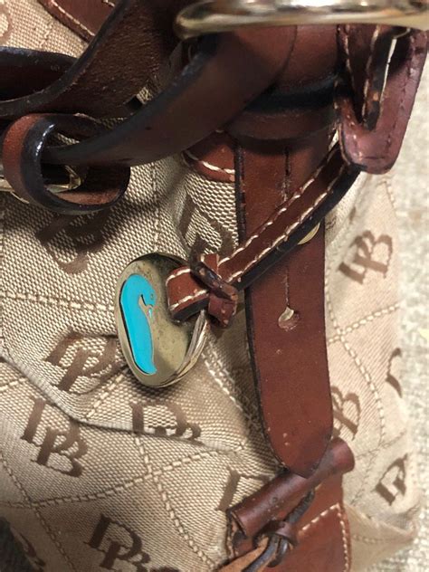 Dooney Bourke Hobo Signature 1975 Bag On Carousell