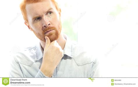 Positive Red Hair Beard Man Thinking About New Startup Project Stock