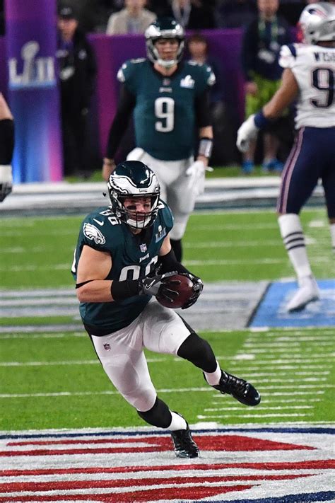 Eagles tight end ZACH ERTZ drives for a first down - Gold Medal Impressions