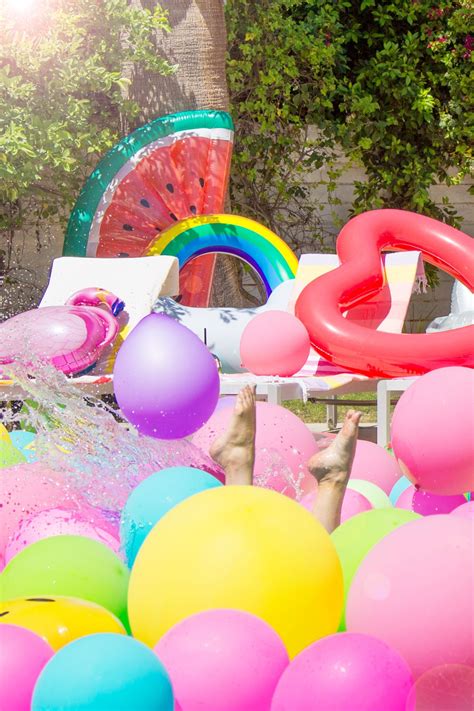 An Epic Rainbow Balloon Pool Party C O L O R S Rainbow Balloons