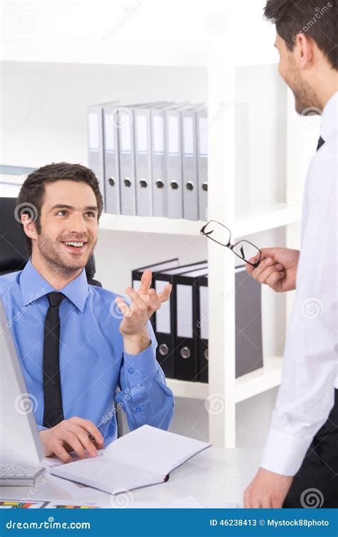 Two Businessmen Having Discussion In Office Stock Image Image Of