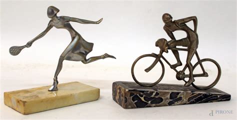 Lotto Composto Da Due Sculture In Metallo Raffiguranti Ciclista E