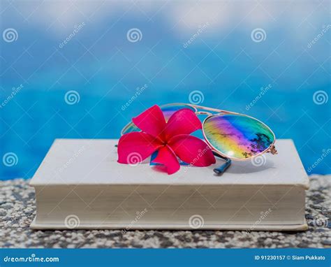 Book And Sunglasses Blue Water Background Stock Image Image Of Square Concept 91230157