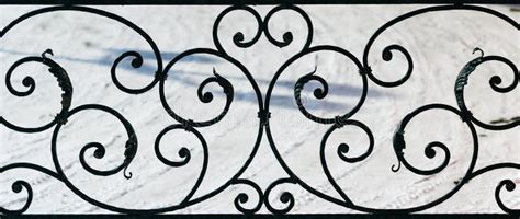 Ornament Forged Metal Decorative Pattern On A Background Of Snow Stock