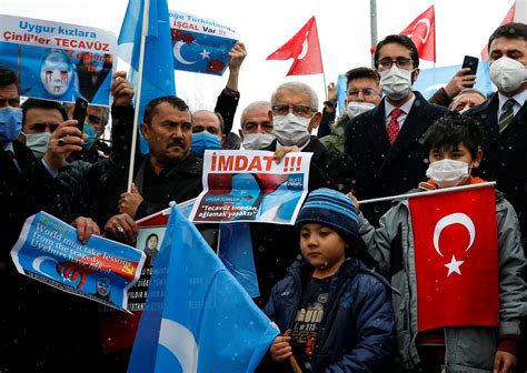 Turkey raises Uighur issue with Chinese minister amid protests | Reuters