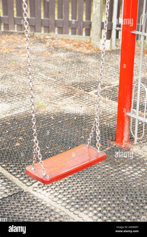 Playground with a fence Stock Photo - Alamy