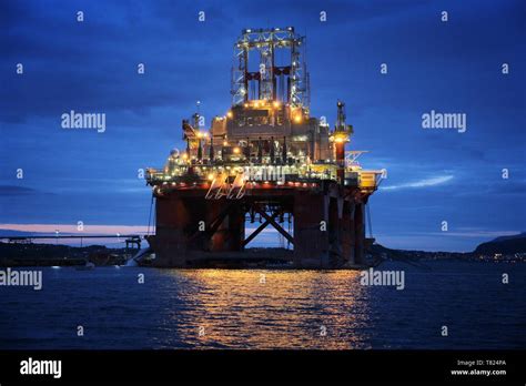 Offshore drilling rig under construction in a fiord in Norway. Oil ...