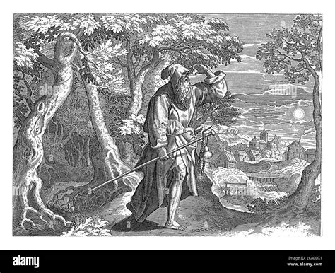 Mutius, an early Christian hermit, in a forest. In his hands a hermit's ...